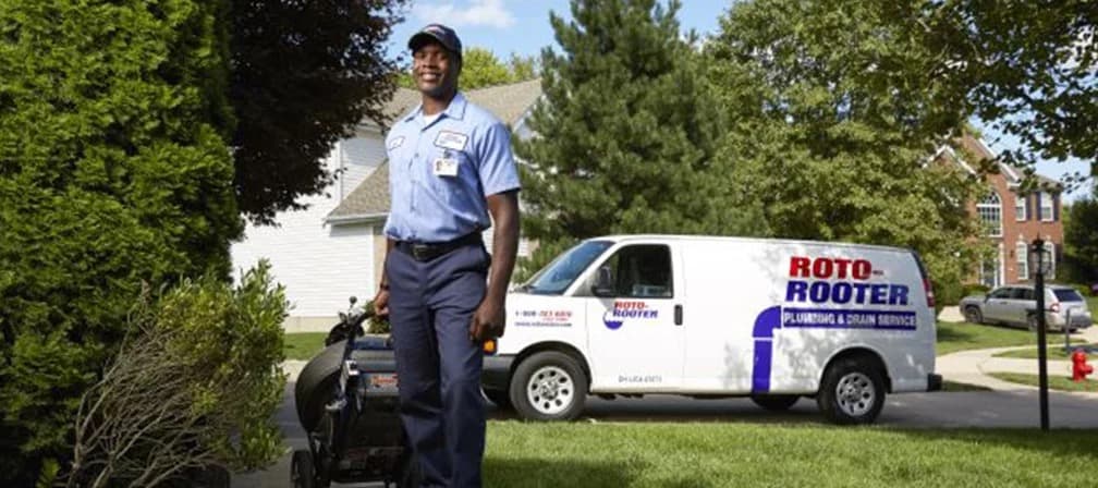 Roto-Rooter plumber ready for sink repair and installation